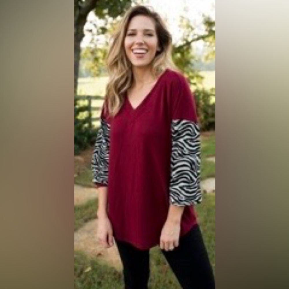 Her Wild Streak Burgundy V-Neck Light Sweatwr Top with Zebra Print Sleeves